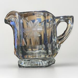 EAPG  CLEAR PANELED STARBURST HEAVY GLASS PEDESTAL BASE CREAMER FLORAL ETCHED